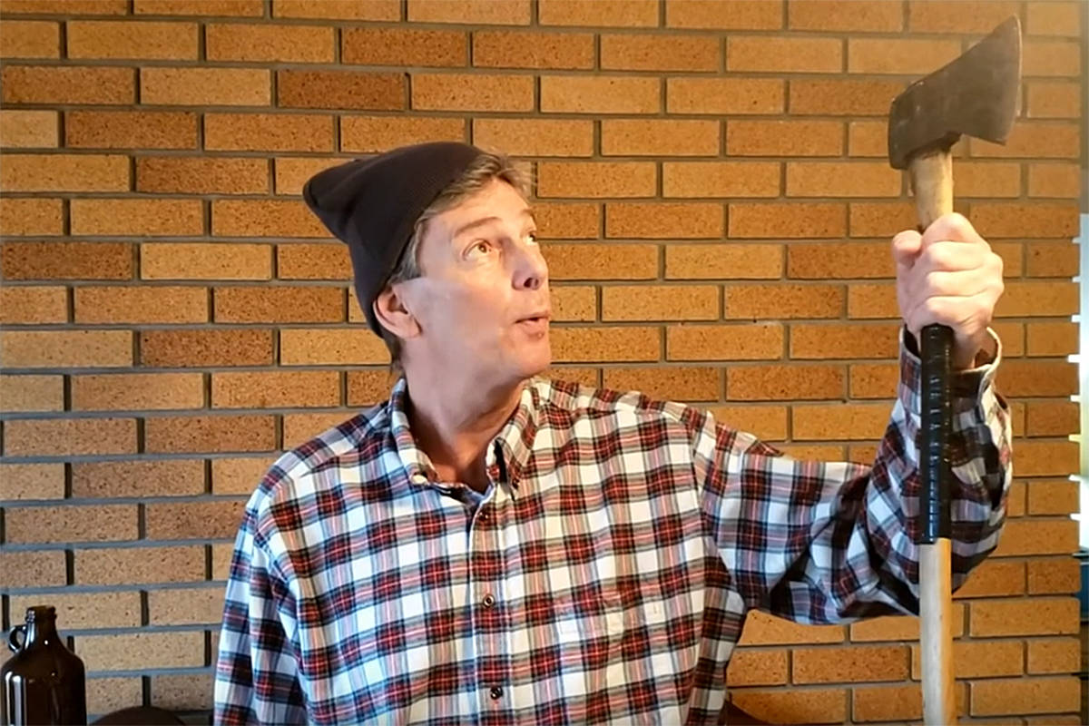 Campbell River mayor Andy Adams dressed up like a lumberjack for a video released by city council encouraging the community to stay strong and keep up the fight against COVID-19 just like iconic downtown carving Logger Mike. City of Campbell River video screen grab/YouTube