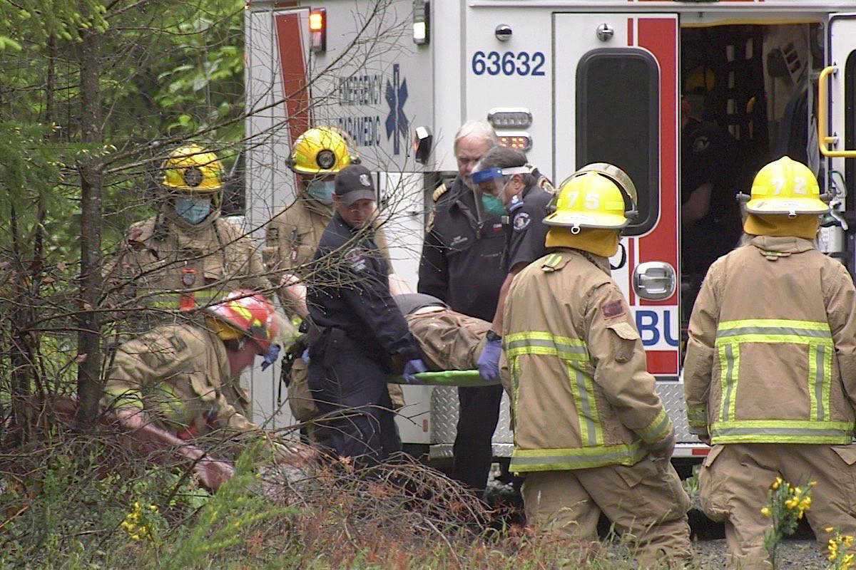Emergency personnel tend to an ATV rider who crashed Monday near the base of Mount Washington. Photo supplied