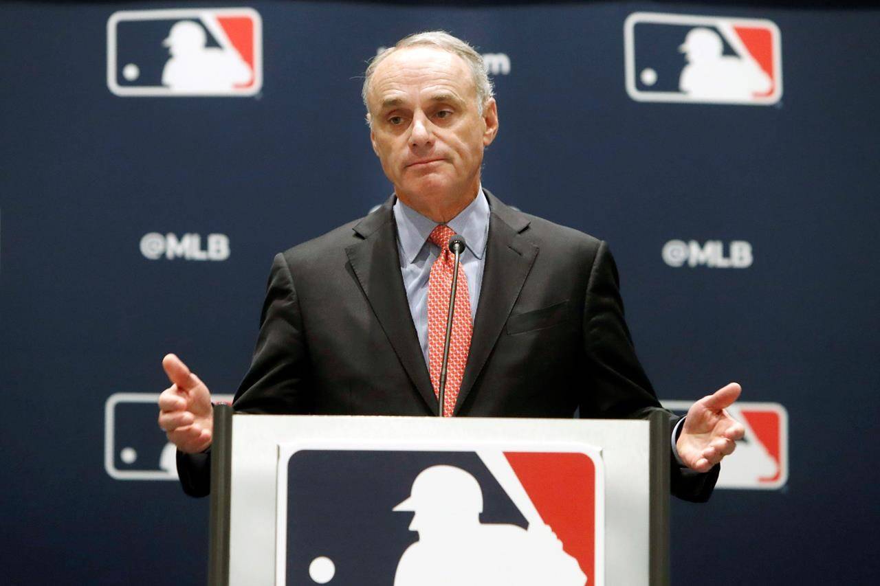 FILE - In this Nov. 21, 2019, file photo, baseball commissioner Rob Manfred speaks to the media at the owners meeting in Arlington, Texas. The chance that there will be no Major League Baseball season increased substantially Monday, June 15, 2020, when the commissioner’s office told the players’ association it will not proceed with a schedule amid the coronavirus pandemic unless the union waives its right to claim management violated a March agreement between the feuding sides. (AP Photo/LM Otero, File)