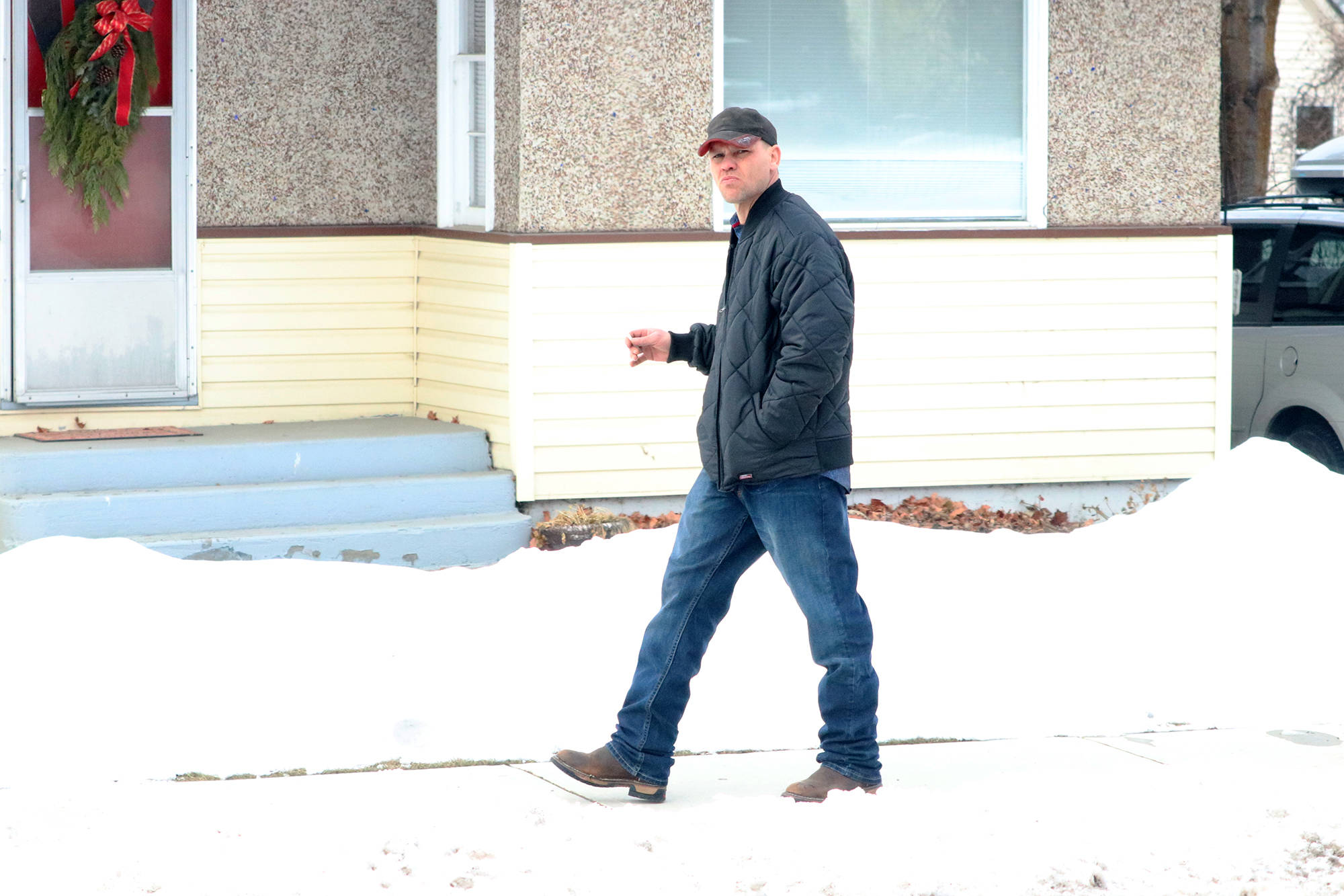 Curtis Sagmoen takes a smoke break during the start of trial Monday, Feb. 10. (Jennifer Smith - Morning Star)