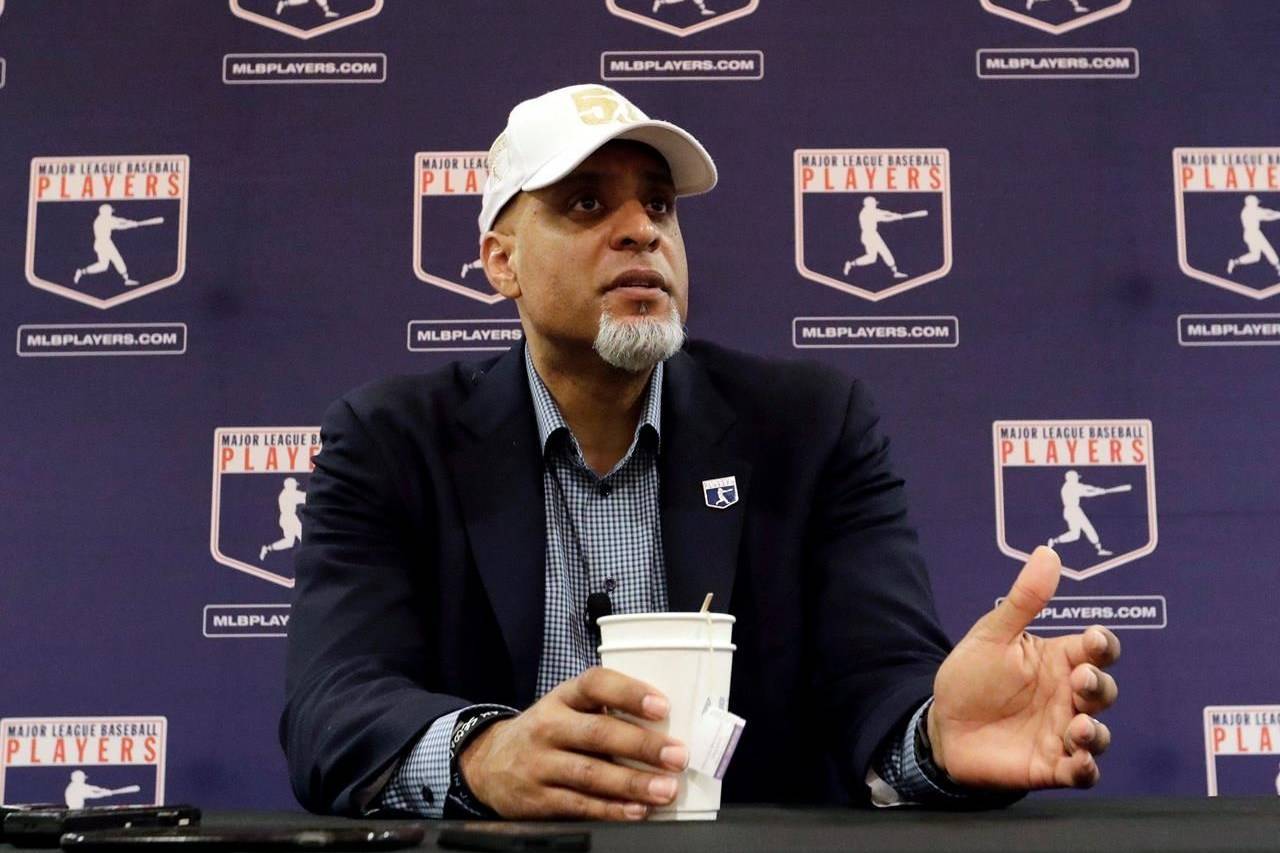 FILE - In this Feb. 19, 2017, file photo, Major League Players Association Executive Director Tony Clark, answers questions at a news conference in Phoenix. Commissioner Rob Manfred says there might be no major league season after a breakdown in talks between teams and the union on how to split up money in a season delayed by the coronavirus pandemic. The league also said several players have tested positive for COVID-19. Two days after union head Clark declared additional negotiations futile, Deputy Commissioner Dan Halem sent a seven-page letter to players’ association chief negotiator Bruce Meyer asking the union whether it will waive the threat of legal action and tell MLB to announce a spring training report date and a regular season schedule. (AP Photo/Morry Gash, File)