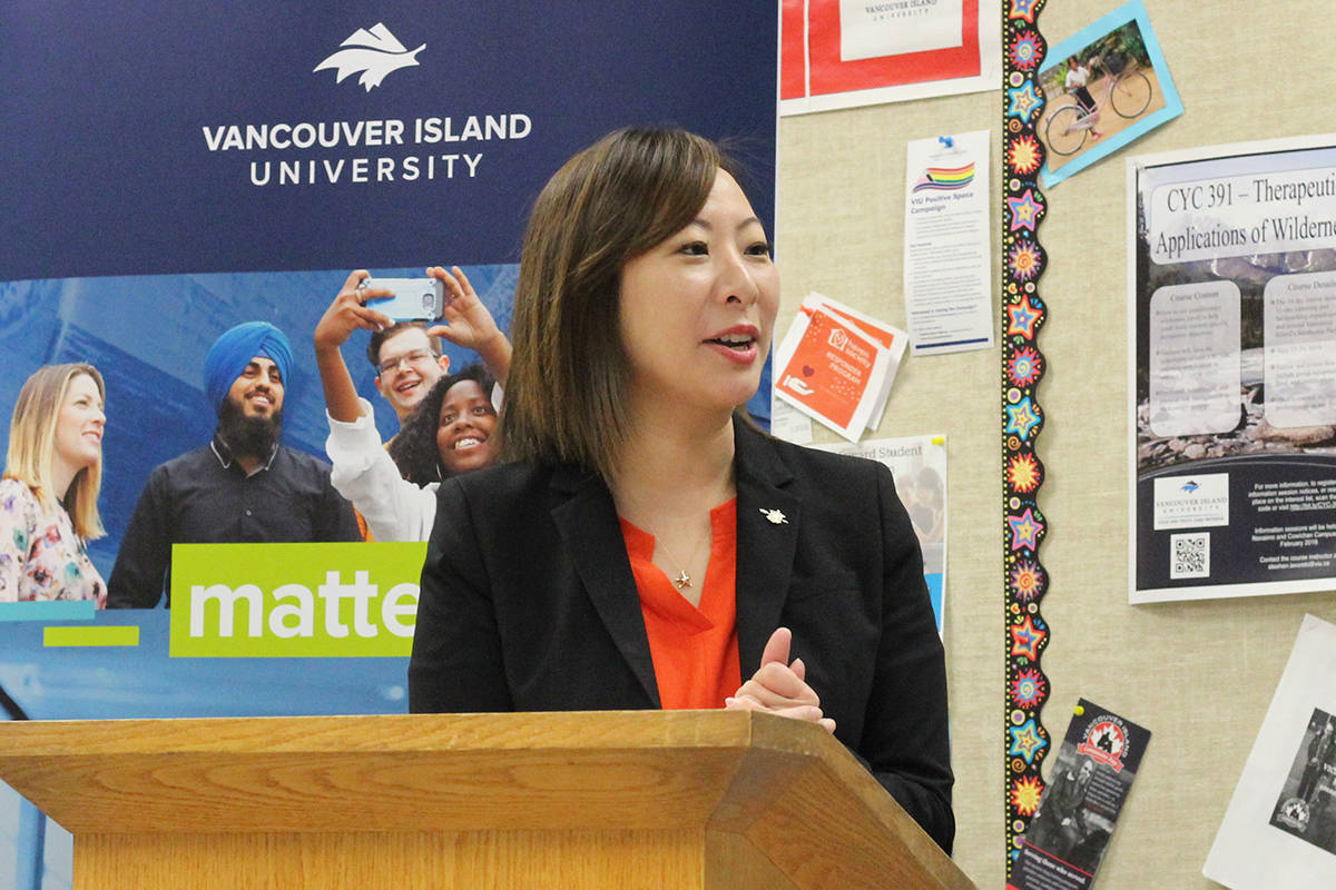 B.C. minister of state for child care Katrina Chen speaks with a VIU early education student at a funding announcement at the university earlier this year. (News Bulletin file photo)