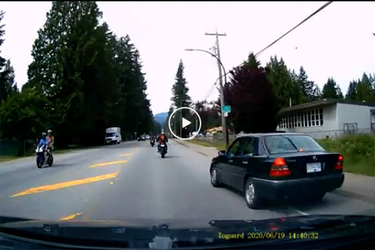 Dashcam footage posted on Reddit June 23, 2020 shows a driver of a car speeding through a Maple Ridge school zone and veering into oncoming traffic passing a pair of motorcycles. (Screenshot)