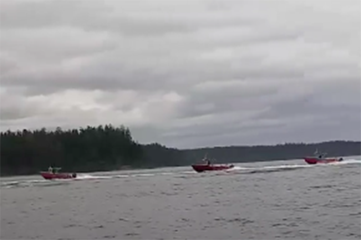 A screenshot of a video posted to social media on Saturday, July 4, 2020 shows Queen Charlotte Lodge fishing vessels boating by local residents. The incident at sea has been described as “dangerous” by both Duffy Edgars, chief councillor for the Old Massett Village Council, and lodge president Paul Clough. (Brandon Kallio image)