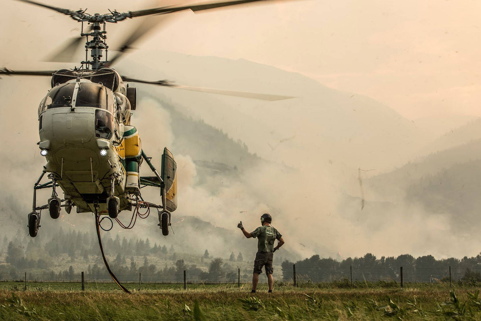 A BC Wildfire helicopter prepares for take off. (Joe Lebeau/Hashmark Photography)