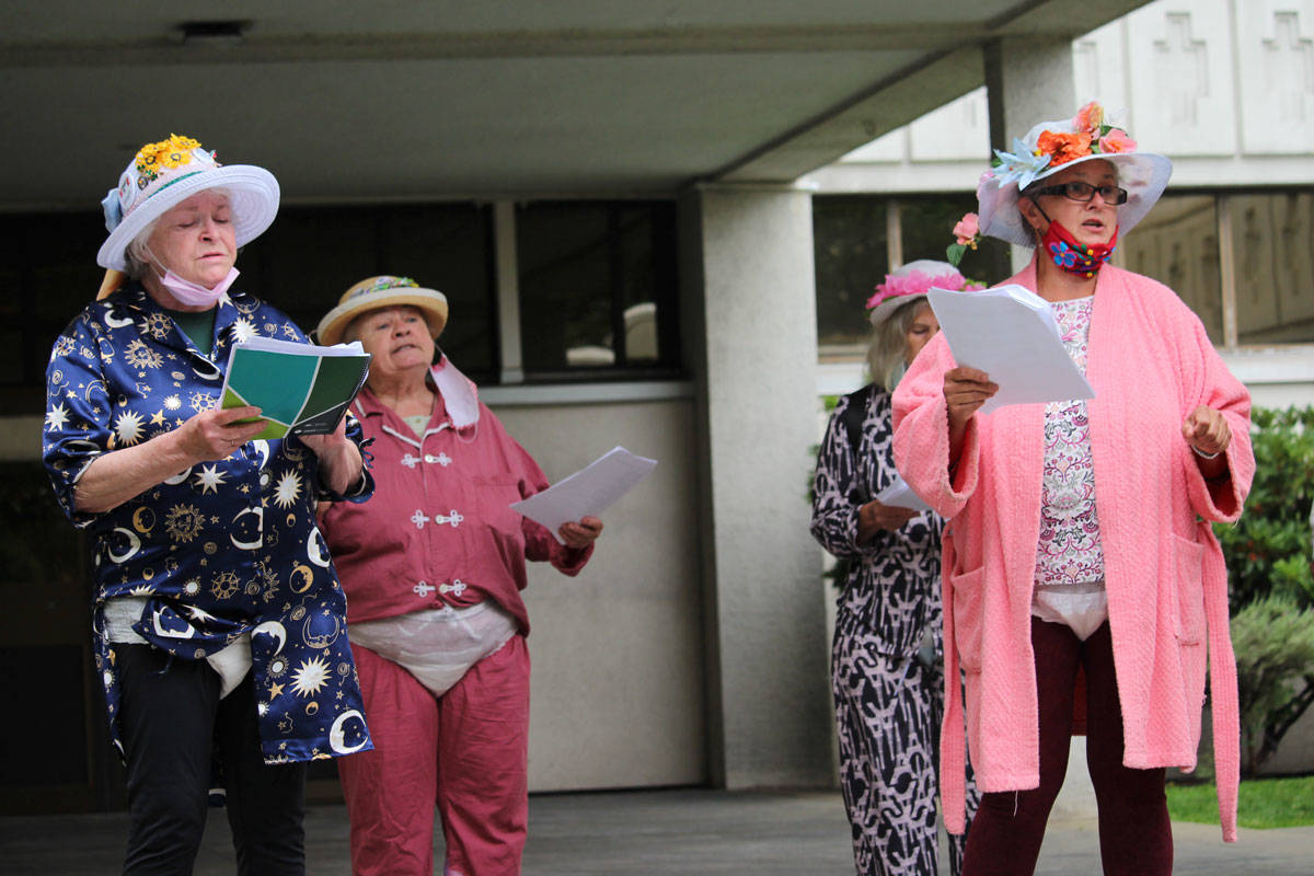 Victoria’s Raging Grannies gathered in front of the B.C. Health Ministry office in Victoria on Thursday to call for an end to public funding of for-profit long-term care homes. (Shalu Mehta/News Staff)