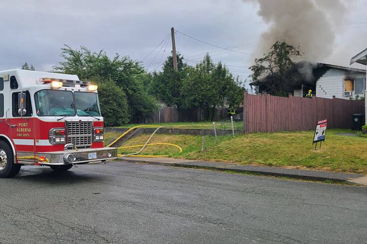 Firefighters with Port Alberni Fire Department respond to a structure fire in the 3600-block of Fifth Avenue on Saturday, July 11, 2020. A house was heavily damaged in the fire. (KYLE CROFTS/ Special to the News)