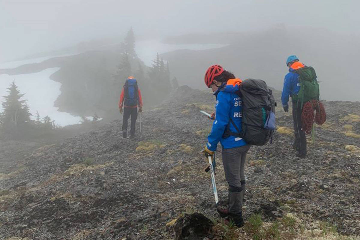 Search and rescue volunteers look for an overdue hiker in mountainous terrain near Gold River, B.C. Photo by Campbell River Volunteer Search and Rescue Society – Facebook