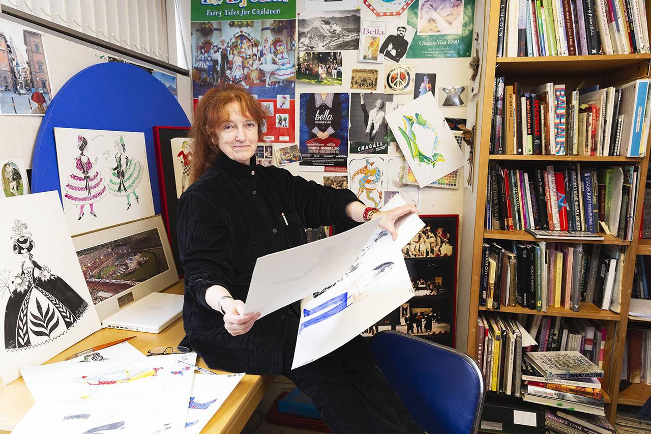 Dr. Mary Kerr on the desk of her office. The theatre professor has been recognized for transforming stages through her design for five decades. (UVic Photo Services)