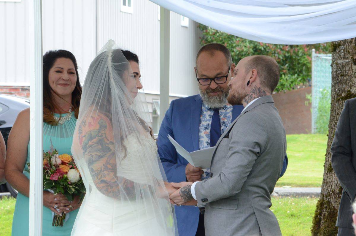 April Powell and Hayden Eely exchange vows in Courtenay after changing wedding plans because of pandemic restrictions. Photo by Mike Chouinard
