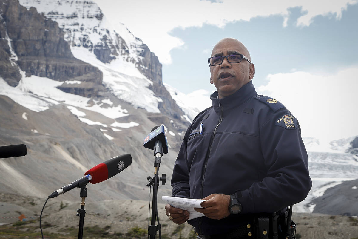RCMP Sgt. Rick Bidaisee, Jasper Detachment Commander, speaks to the media about three passengers who were killed when a glacier sightseeing bus rolled over at the Columbia Icefields near Jasper, Alta., Sunday, July 19, 2020. THE CANADIAN PRESS/Jeff McIntosh