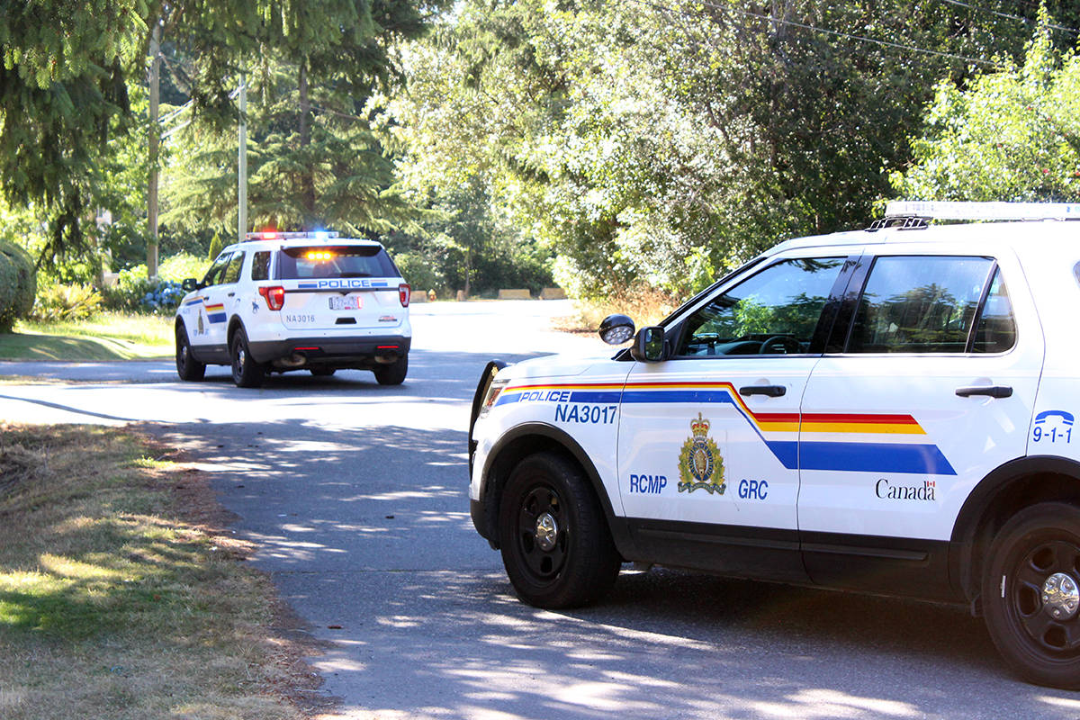 Nanaimo RCMP vehicles on Malpass Road on Sunday afternoon. (News Bulletin photo)