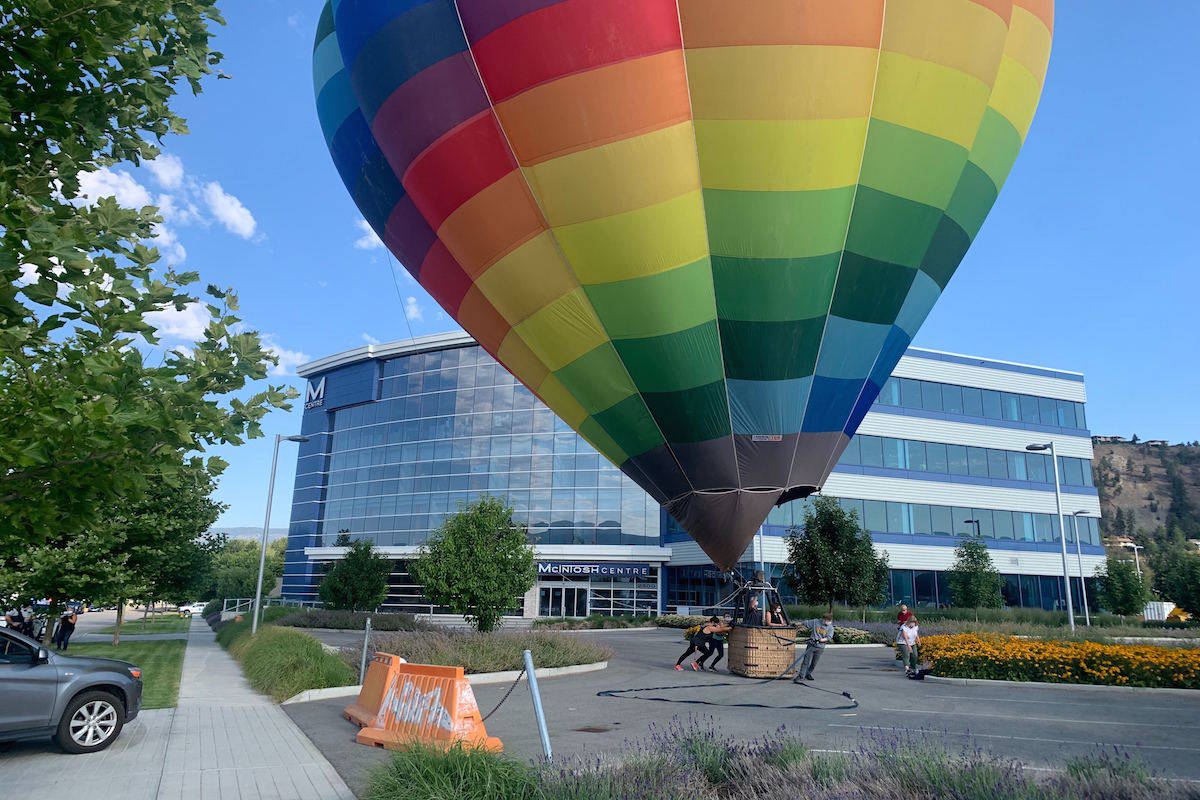 Hot air balloon makes an expected landing at the Mcintosh Centre in Kelowna, B.C. on July 30. (Photo - Daniel Taylor)