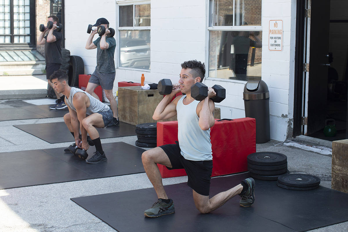 FILE – A fitness class takes place at Delta Train Liberty Village in Toronto, Friday, July 10, 2020. THE CANADIAN PRESS/Chris Young