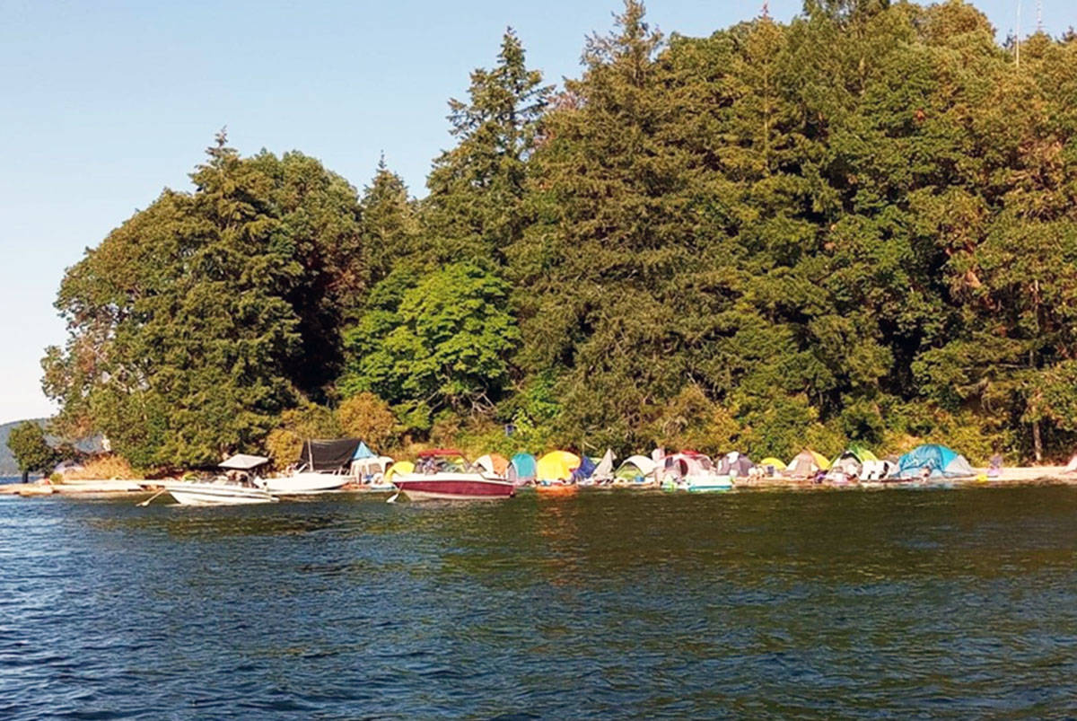 Campers along the beach on Tent Island. (Photo submitted)