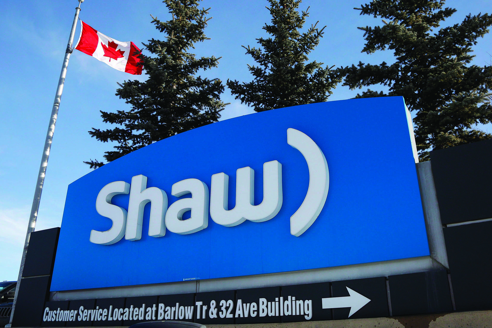 A Shaw Communications sign at the company’s headquarters in Calgary, on January 14, 2015. Shaw Communications Inc. has launched its FreeRange TV mobile streaming app, bringing the company in line with rivals in offering its full TV service to any subscriber with an Internet or mobile data connection. THE CANADIAN PRESS/Jeff McIntosh