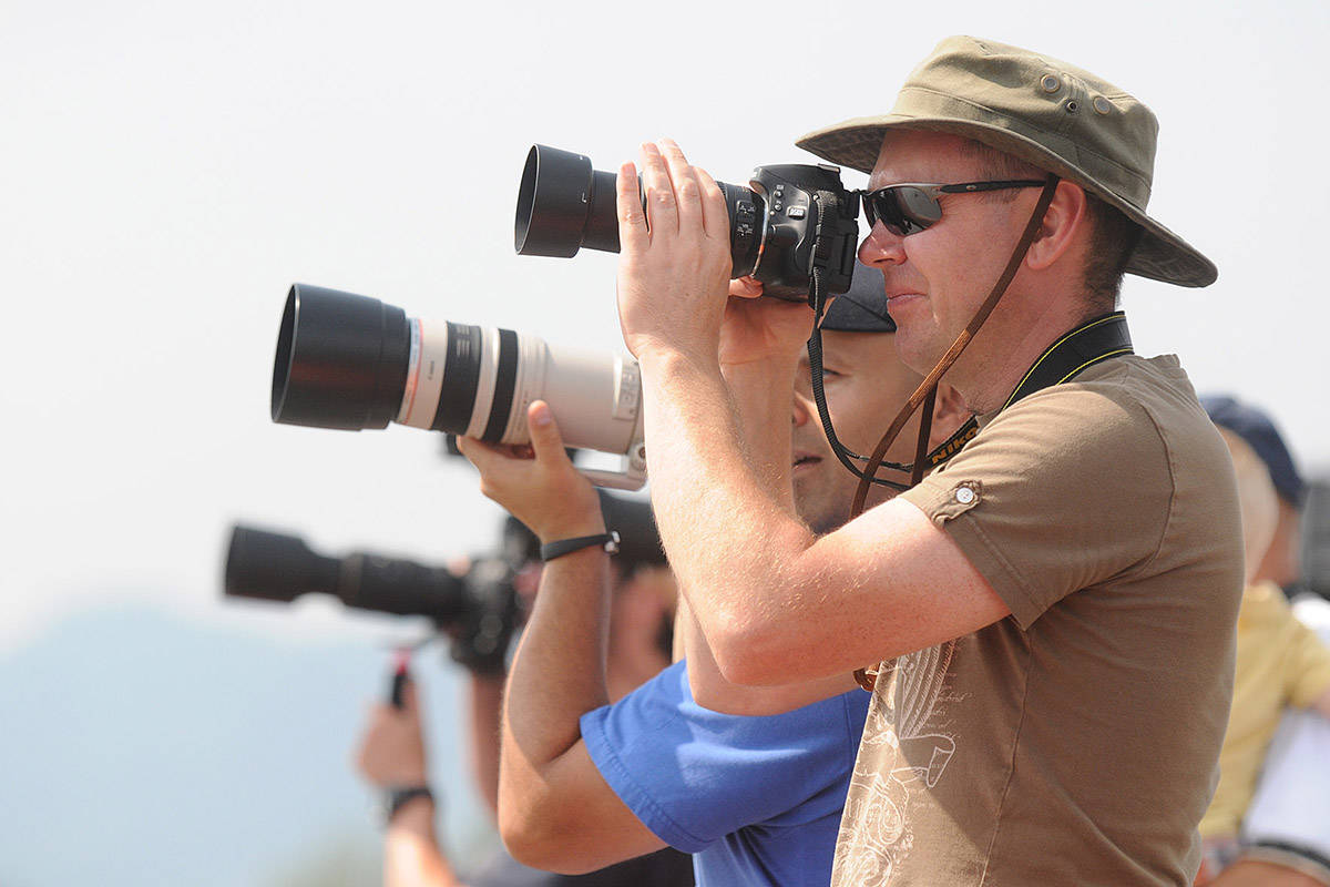 Wednesday, Aug. 19, 2020 is World Photo Day. Above, photographers capture images at Chilliwack Flight Fest on Aug. 17, 2014. (Jenna Hauck/ Chilliwack Progress file)
