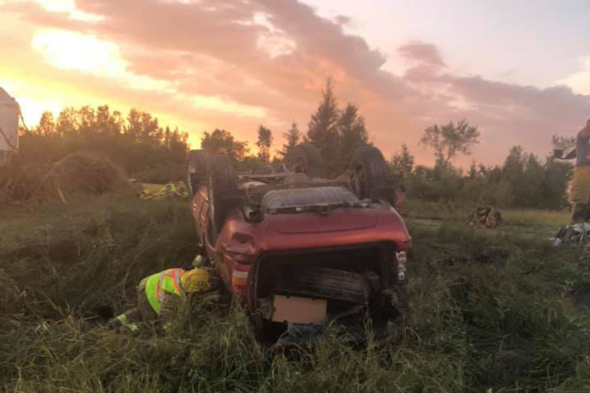 James Blacksmith said the windows on his vehicle were blown out by a tornado in Manitoba on Aug. 7 before it was tossed over and over again before landing on its roof. A first responder checks on an overturned vehicle at the scene where a tornado touched down, uprooting trees and overturning two vehicles near Virden, Man., in a Friday, Aug. 7, 2020, handout photo published to social media. THE CANADIAN PRESS/HO-Wallace District Fire Department, *MANDATORY CREDIT*