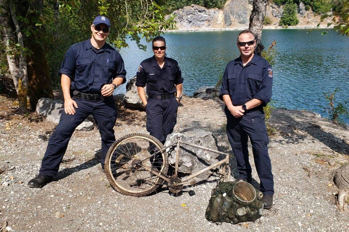 Saanich police divers helped clear garbage from the Shawnigan Lake quarry after a training session. (Saanich Police/Twitter)
