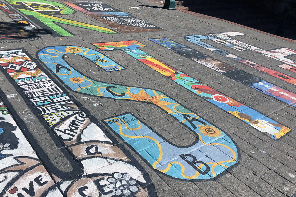 The City of Victoria asked the organizer behind a mural in Bastion Square to removed the acronym A.C.A.B. from one of the letters. The mural reads, “More Justice, More Peace,” in a call for progress on racism and violence. (Nina Grossman/News Staff)