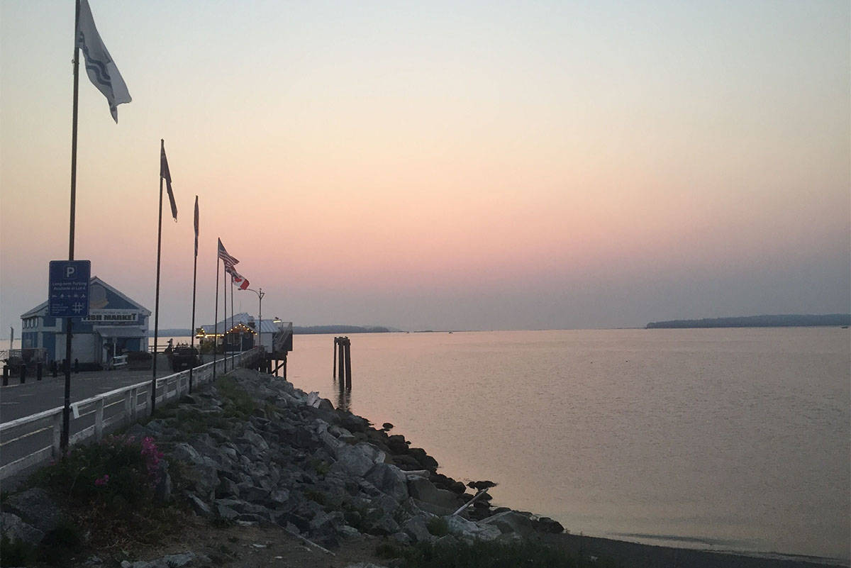 Smoky skies greeted residents across Greater Victoria Tuesday morning. The haze even obscured mountain views from Sidney. (Wolfgang Depner/News Staff)