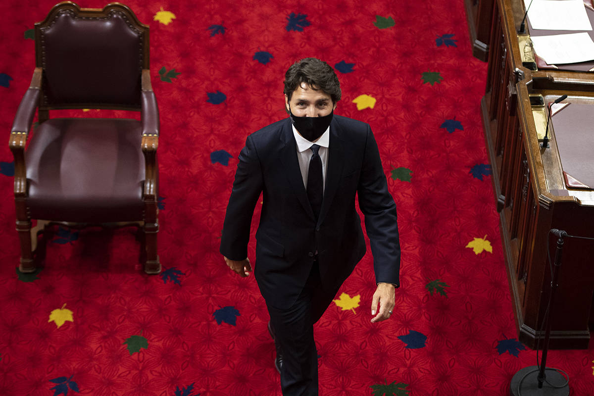 Prime Minister Justin Trudeau heads back to his seat before the delivery of the Speech from the Throne at the Senate of Canada Building in Ottawa, on Wednesday, Sept. 23, 2020. THE CANADIAN PRESS/Justin Tang
