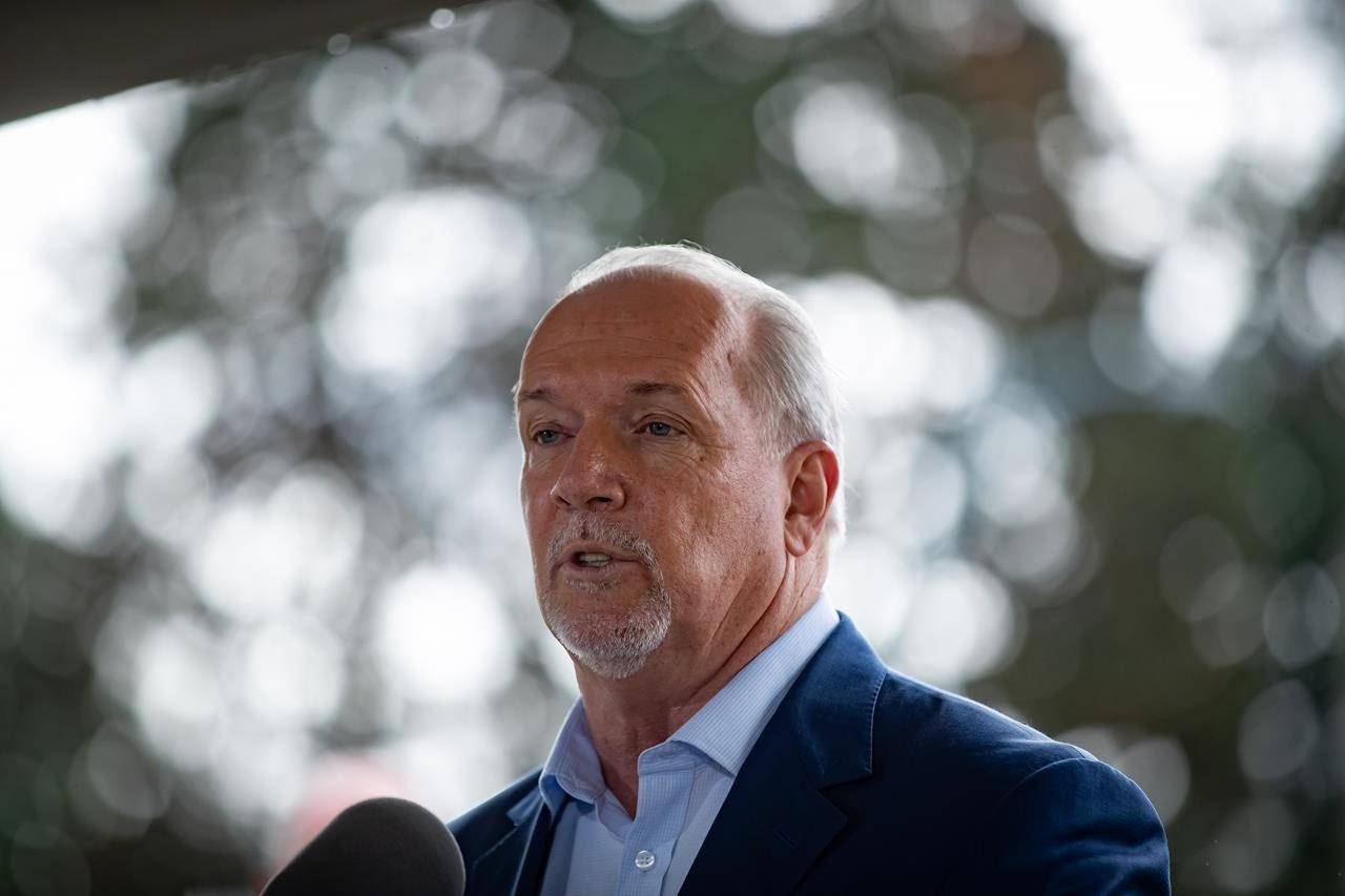 Horgan, Wilkinson trade barbs over MSP premiums, health care at campaign stops