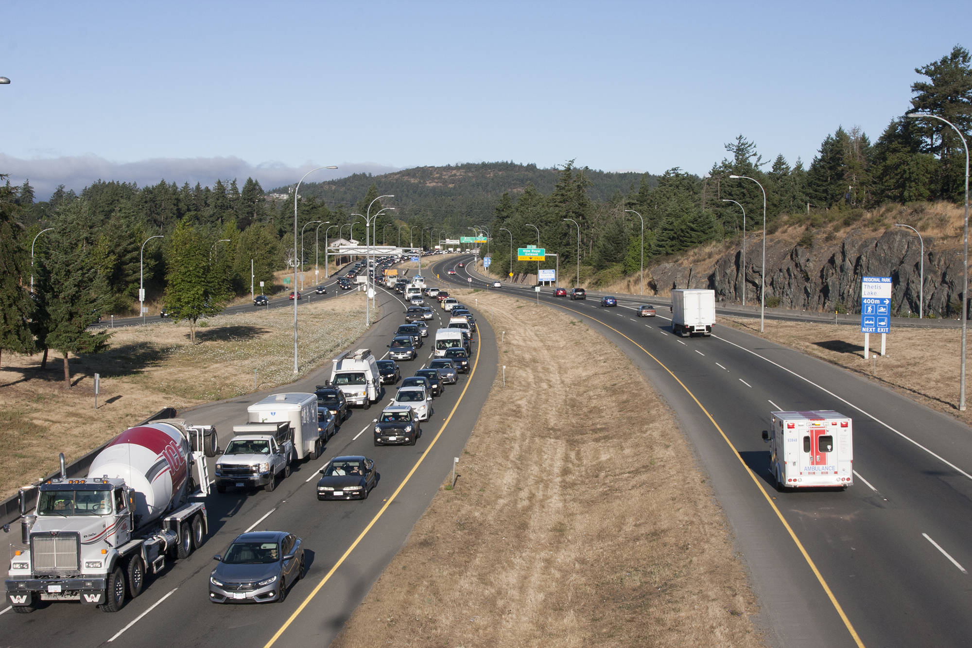 Morning commuters inch along the Trans Canada Highway near the Helmcken Road overpass in View Royal. South Island transportation issues are among the focuses of a questionnaire sent by 11 local mayors to the three main party leaders and all regional candidates in the Oct. 24 provincial election. (Black Press Media file photo)
