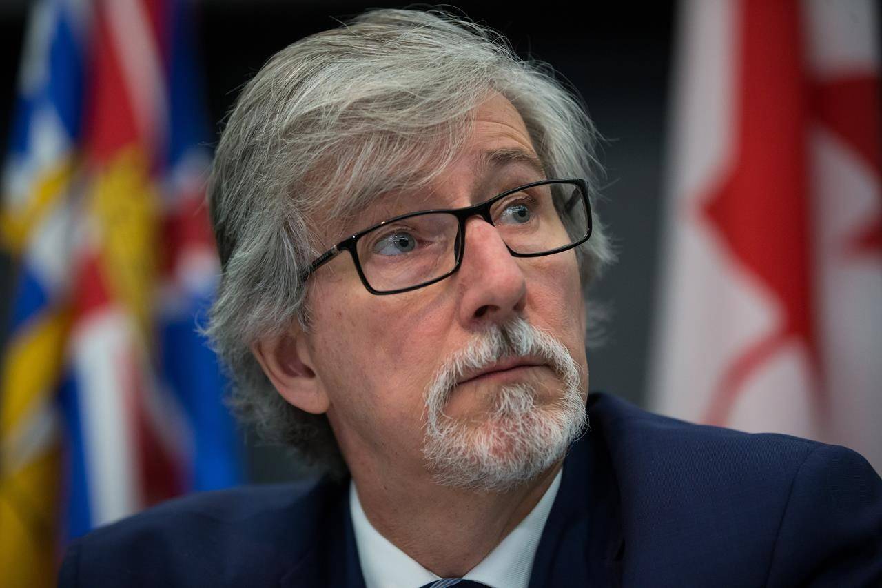 Privacy Commissioner of Canada Daniel Therrien listens during a news conference in Vancouver, Tuesday, Nov. 26, 2019. THE CANADIAN PRESS/Darryl Dyck
