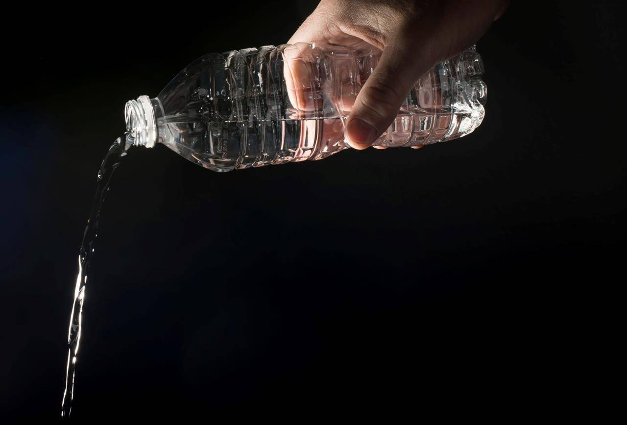 Bottled water is pictured in North Vancouver, B.C., Tuesday, May 7, 2019. Canada’s proposed ban on single-use plastics may not run afoul of its trade deal with the United States and Mexico, but experts suggest it disregards the “pause-and-check” spirit of the agreement. THE CANADIAN PRESS/Jonathan Hayward