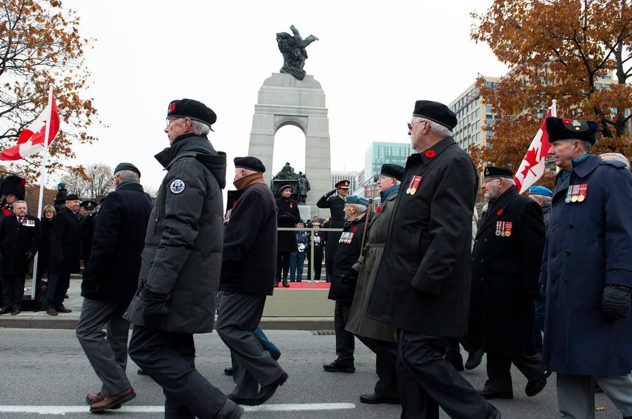 The Royal Canadian Legion is doing what was once the unthinkable: Discouraging people from attending Remembrance Day ceremonies in person this year. The 2019 National Silver Cross Mother, Reine Samson Dawe, middle left, and Governor General Julie Payette, middle left, watched the parade during the Remembrance Day ceremony at the National War Memorial in Ottawa, Monday, Nov. 11, 2019. THE CANADIAN PRESS/Sean Kilpatrick