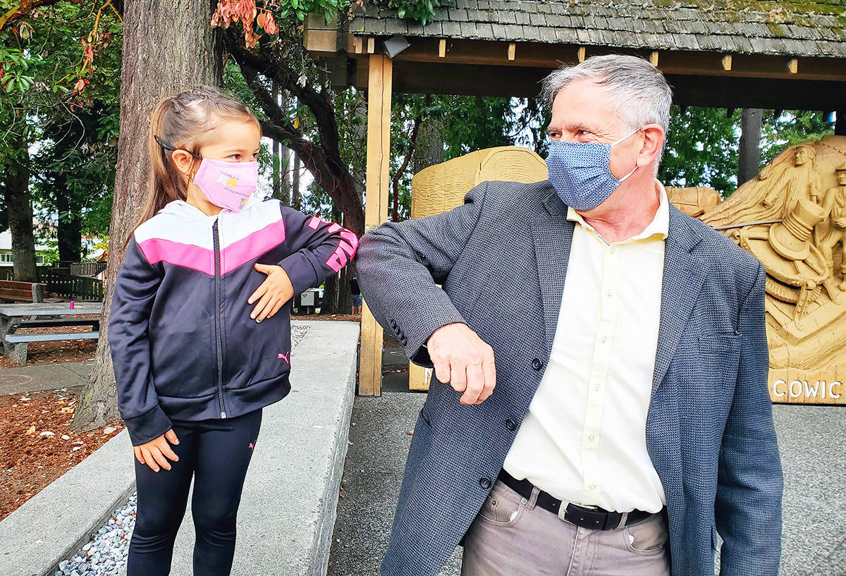 Doug Routley meets and greets young and old alike on the campaign trail for the NDP in Chemainus. (Photo submitted)