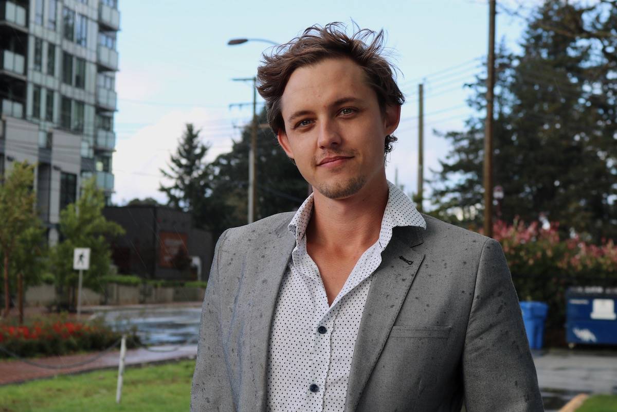Tyson Strandlund, 28, is running in the Langford-Juan de Fuca riding under the B.C. Communist Party flag. (Aaron Guillen/News Staff)
