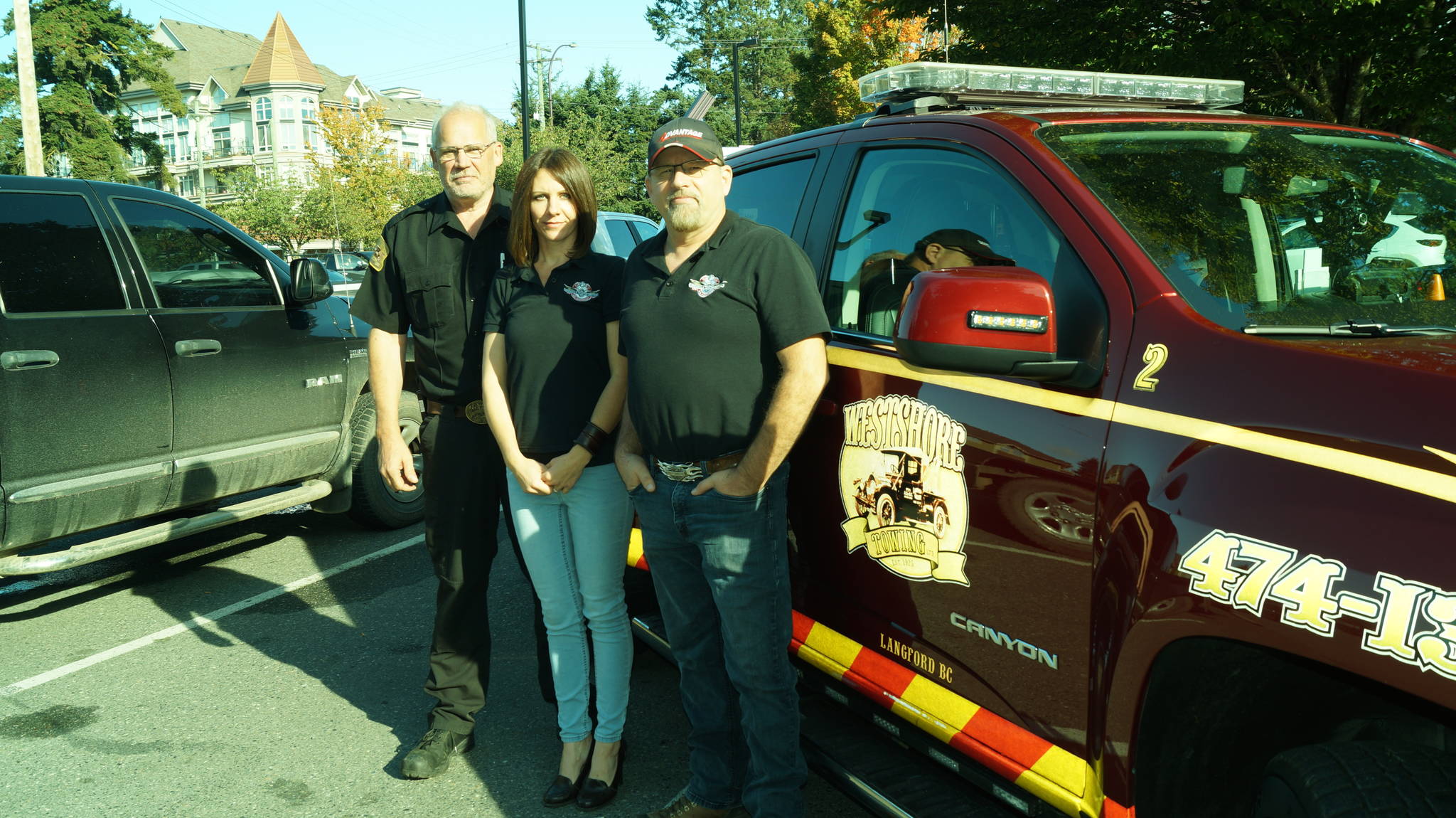 Westshore Towing owner Dave LeQuesne (left) and Peninsula Towing owners Meghan and Don Affleck say dealing with abandoned vehicles, boats, RVs and campers is a significant financial burden. (Rick Stiebel/News Staff)