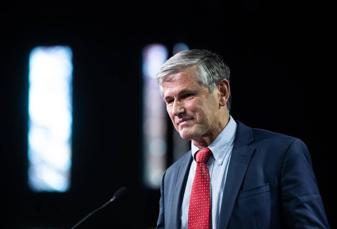 BC Liberal Leader Andrew Wilkinson leaves the stage after announcing he is stepping down as party leader, during a news conference in Burnaby, B.C., on Monday, October 26, 2020. THE CANADIAN PRESS/Darryl Dyck