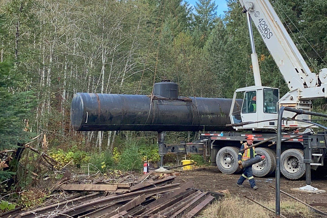 Crews remove a rail tank that was found to be leaking bunker oil in the rail yard at McLean Mill National Historic Site the week of Oct. 26, 2020. (SUBMITTED PHOTO)