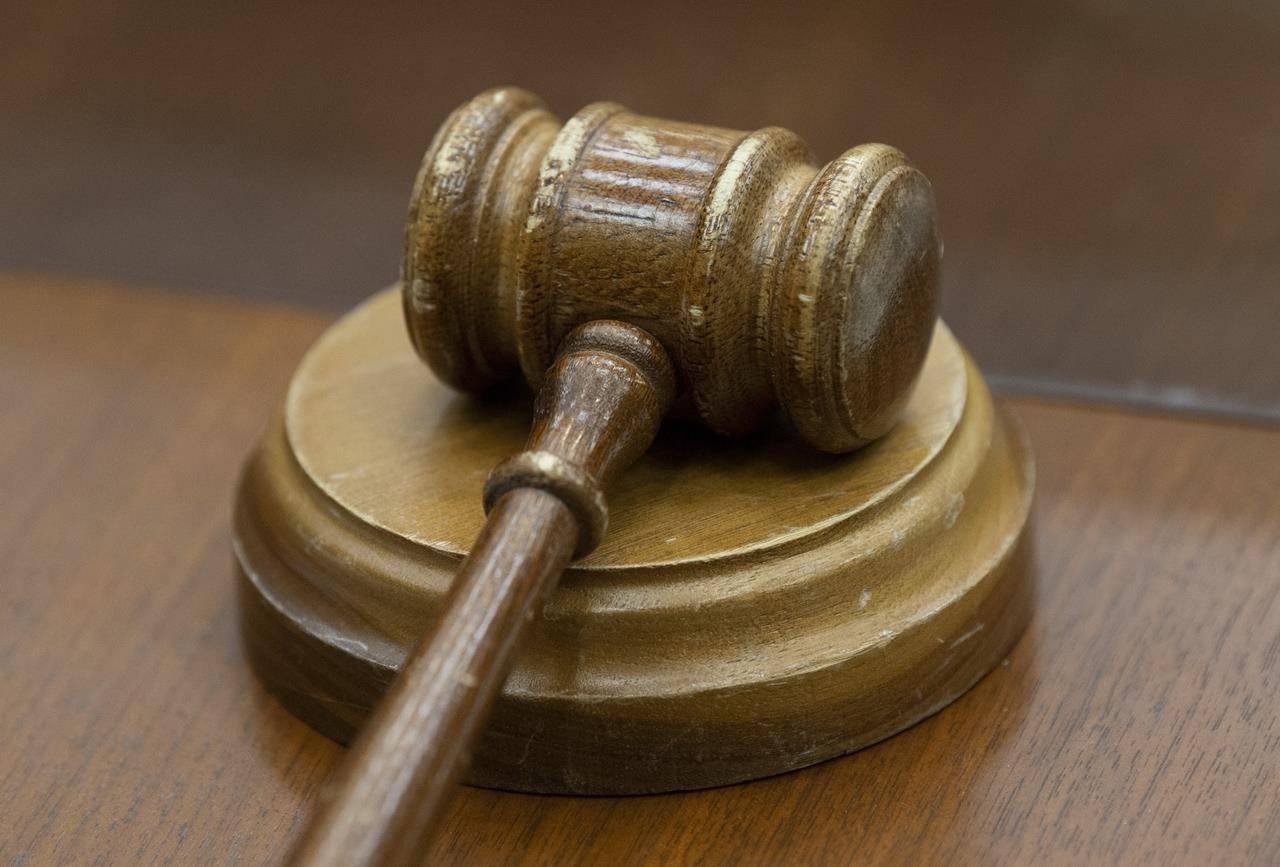 A gavel sits on a desk in Ottawa, Wednesday February 13, 2019. An Ontario judge was wrong to order a legal fight involving victims of one of the country’s most notorious residential schools and the federal government be heard in British Columbia, a higher court has ruled. THE CANADIAN PRESS/Adrian Wyld
