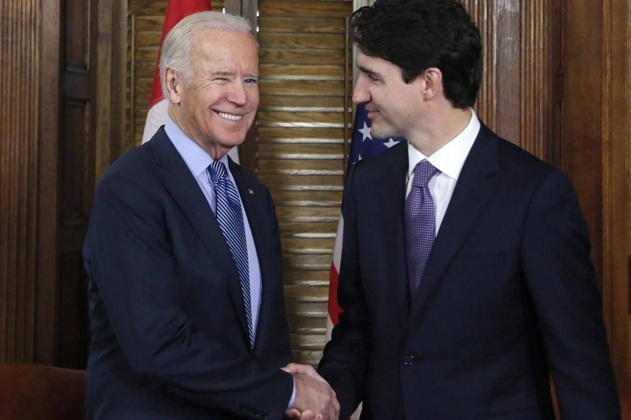 Prime Minister Justin Trudeau shakes hands with US Vice-President Joe Biden on Parliament Hill in Ottawa on Friday, December 9, 2016. THE CANADIAN PRESS/ Patrick Doyle