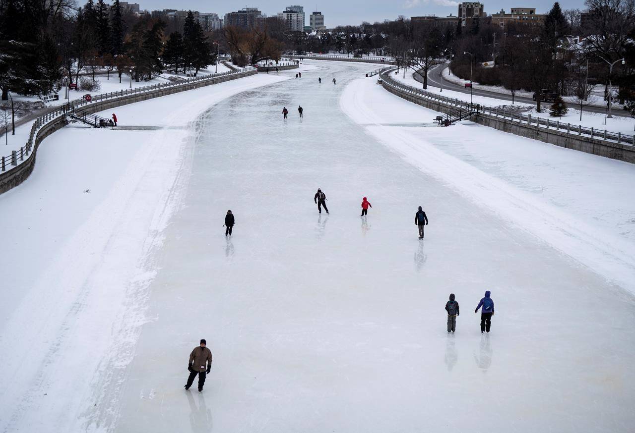 Skaters makes their way along the Rideau Canal Skateway in Ottawa on the opening day of its 50th season, on Saturday, Jan. 18, 2020. From manufactured rinks in city parks, to lengthy swaths of iced-over rivers, Canada’s outdoor public skating spaces may prove popular during the first full winter of the COVID-19 pandemic. THE CANADIAN PRESS/Justin Tang