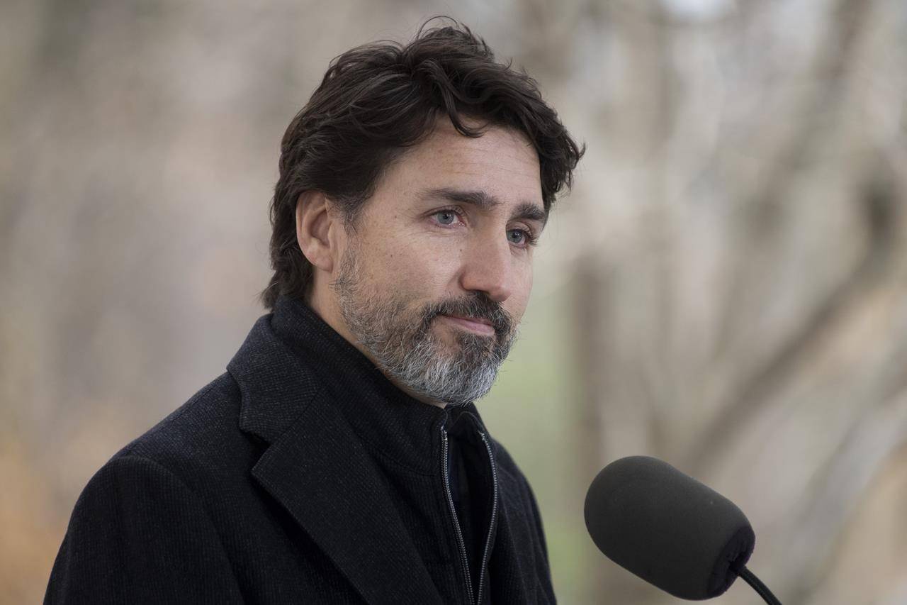Prime Minister Justin Trudeau pauses after responding to a question about the holidays during a news conference outside Rideau Cottage in Ottawa, Friday, Nov. 20, 2020. THE CANADIAN PRESS/Adrian Wyld