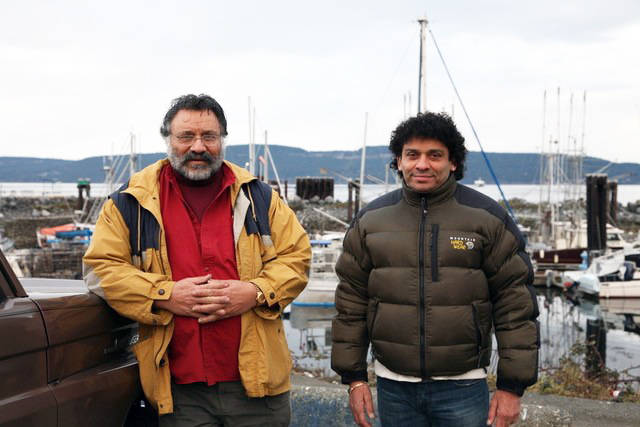 Bhagwan Mayer and son John on the Crofton waterfront. (Photo submitted)