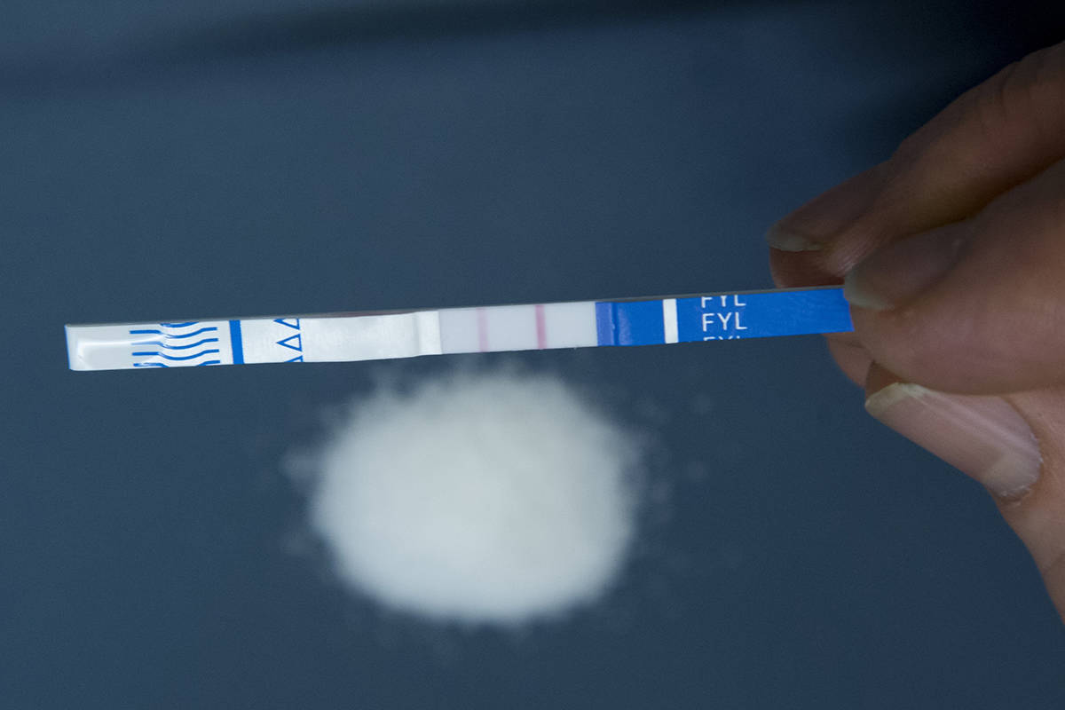 A fentanyl test strip is used at Vancouver Coastal Health in Vancouver, Tuesday, January, 21, 2020. The test strips will be made available to drug users to ensure that their drugs are safe and free of Fentanyl. THE CANADIAN PRESS/Jonathan Hayward