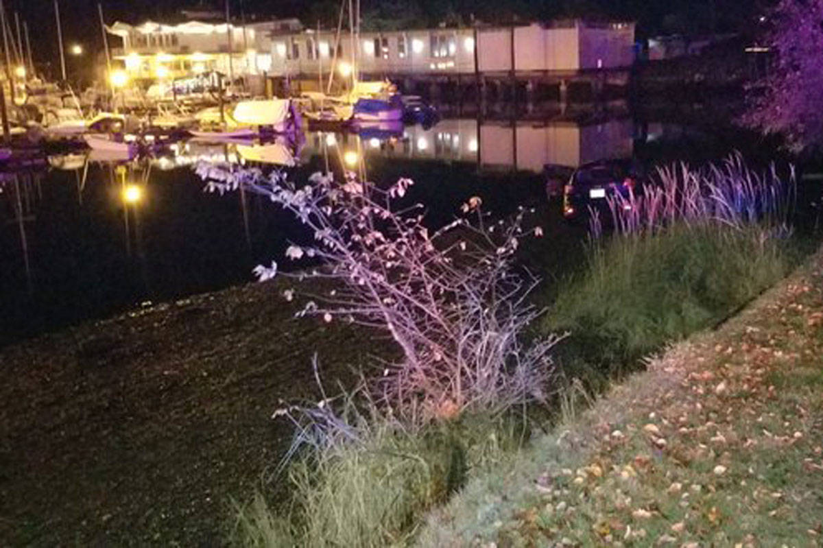 A 43-year-old woman is facing charges for impaired driving and leaving the scene of a crash after attempting to flee from police by driving down the beach in front of the Oak Bay Marina on Nov. 23. (Oak Bay Police/Twitter)