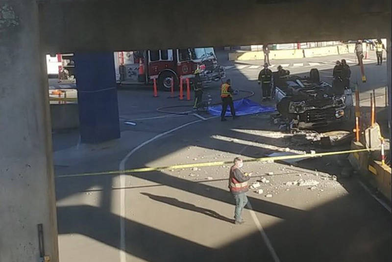 Delta police are investigating after a vehicle drove through a barrier on the ferry ramp and crashed to the ground below at the BC Ferries terminal in Tsawwassen on Tuesday, Dec. 1, 2020. (Chrissybabe1973/Twitter)