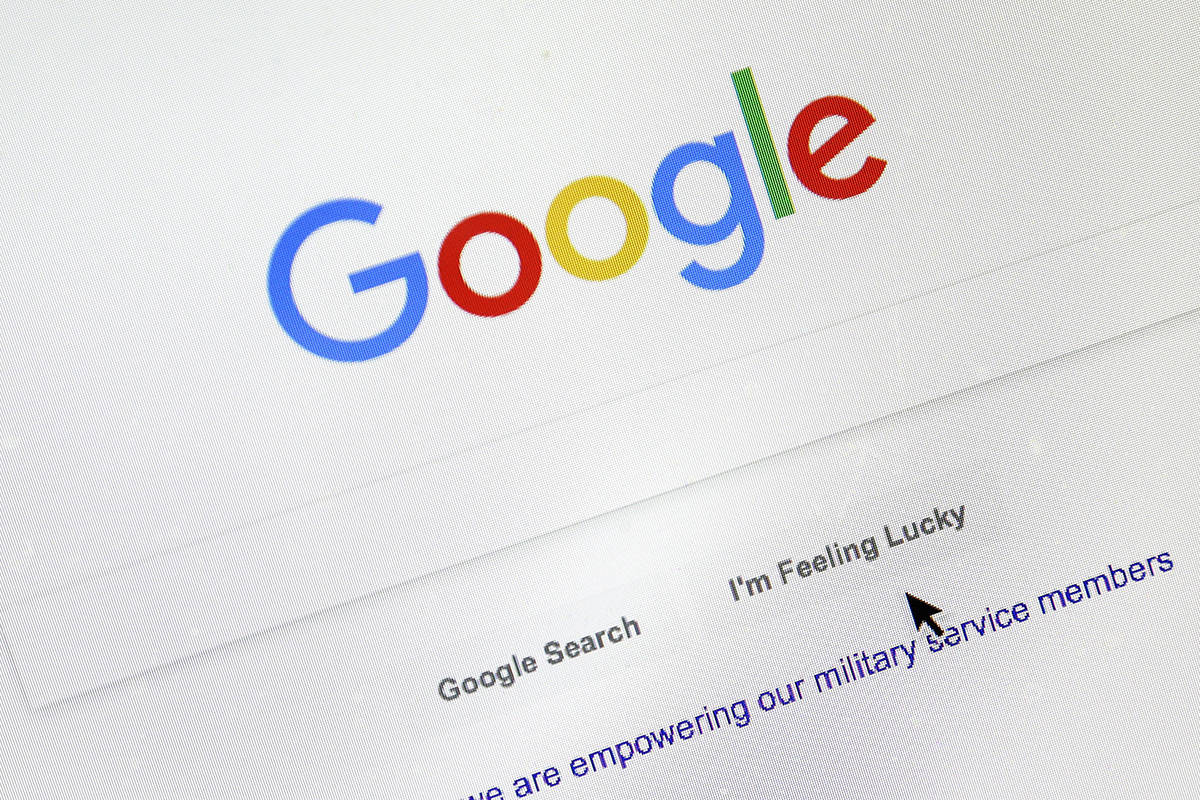 FILE - In this Tuesday, Aug. 28, 2018, file photo, a cursor moves over Google’s search engine page, in Portland, Ore. (AP Photo/Don Ryan, File)