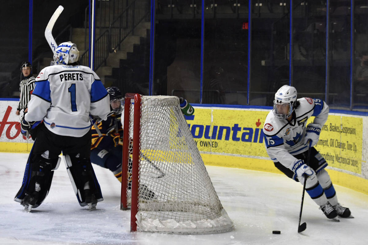 Vees goalkeeper Yaniv Perets stands watch while Tyler Ho takes the puck around the back of the net in the last game of the Okanagan Cup���s round robin stage on Nov. 7. (Brennan Phillips - Western News)