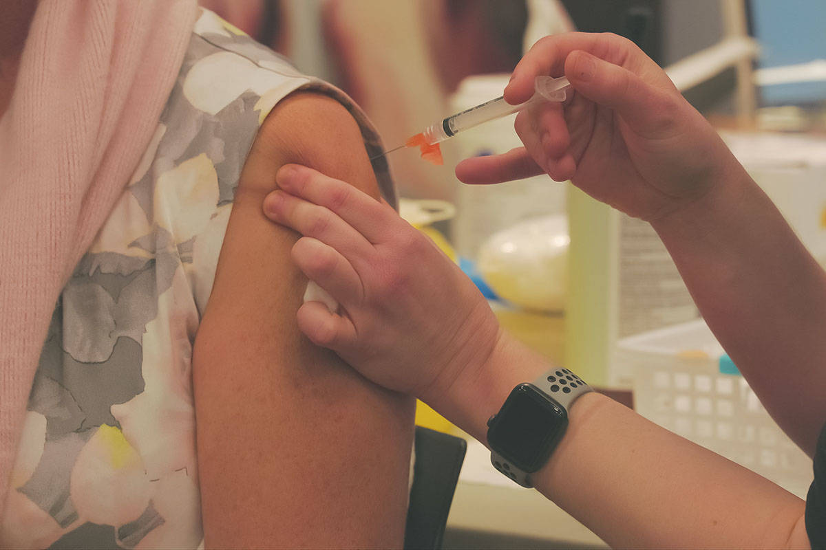 Dr. Bonnie Henry and long-term care workers were the first Islanders to receive the COVID-19 vaccine on Dec. 22. (Courtesy of Island Health)