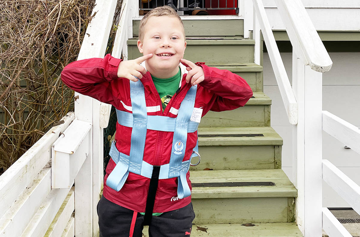 Why is Samuel Douglas smiling so much? You would, too, if you just had a visit with Santa. (Photo submitted)