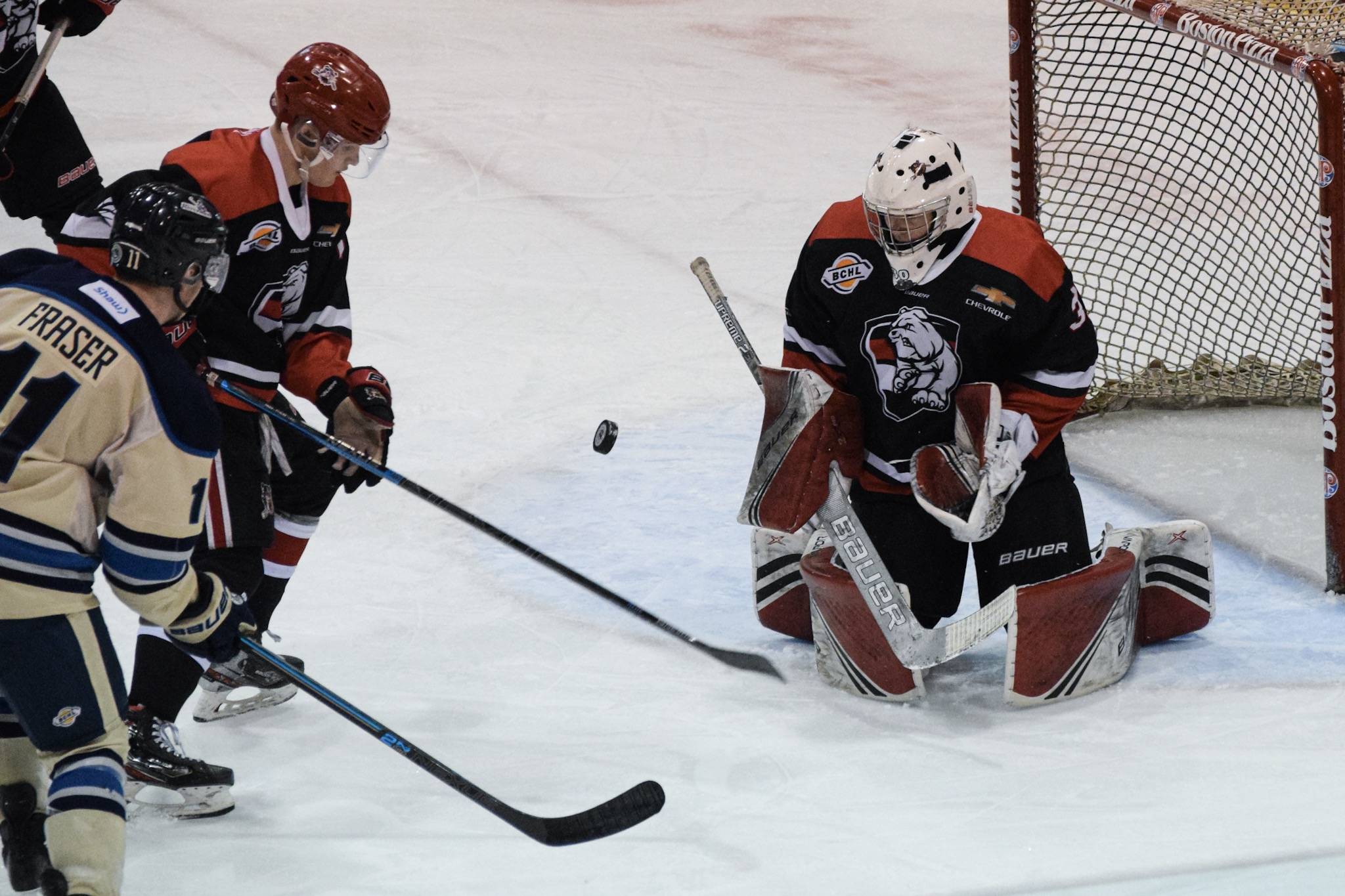 Bulldogs goaltender Luke Pearson makes a save during a January game against Langley. (ELENA RARDON / ALBERNI VALLEY NEWS)