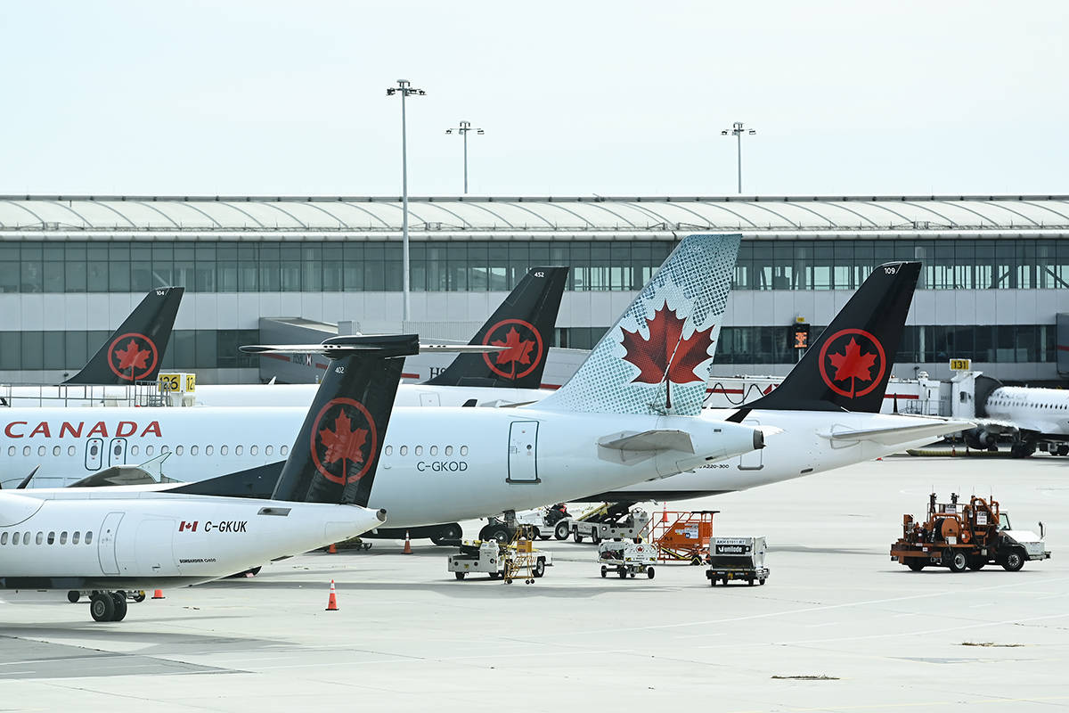 Air Canada planes sit on the tarmac at Pearson International airport during the COVID-19 pandemic in Toronto on Wednesday, Oct. 14, 2020. THE CANADIAN PRESS/Nathan Denette